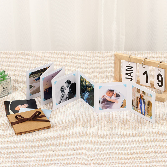 Logotipo personalizado por atacado Kraft Paper Dobing Accordion Foto Album Ribbon Knot Memory Post cartão para formatura Família de bebê de aniversário